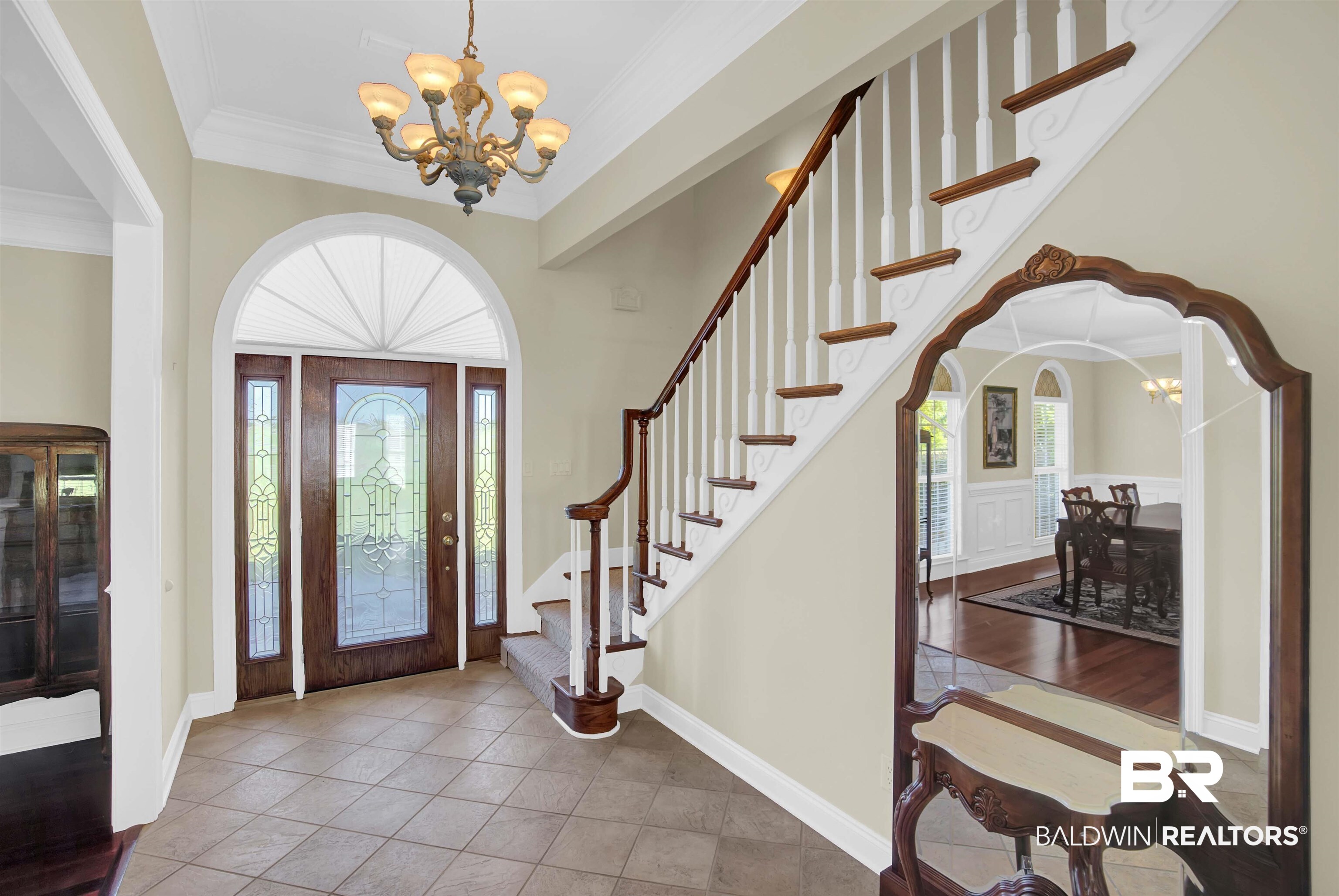 27688 Rigsby Road Daphne, AL 36526 - Photo 9 of 56 Entrance foyer featuring a notable chandelier, light hardwood / wood-style flooring, a wealth of natural light, and crown molding