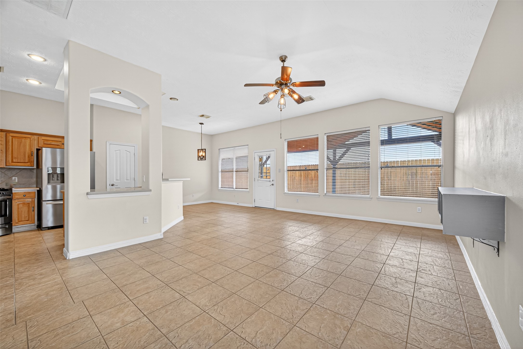 23914 Glengate Drive Spring, TX 77373 - Photo 11 of 49 a view of an empty room with a window