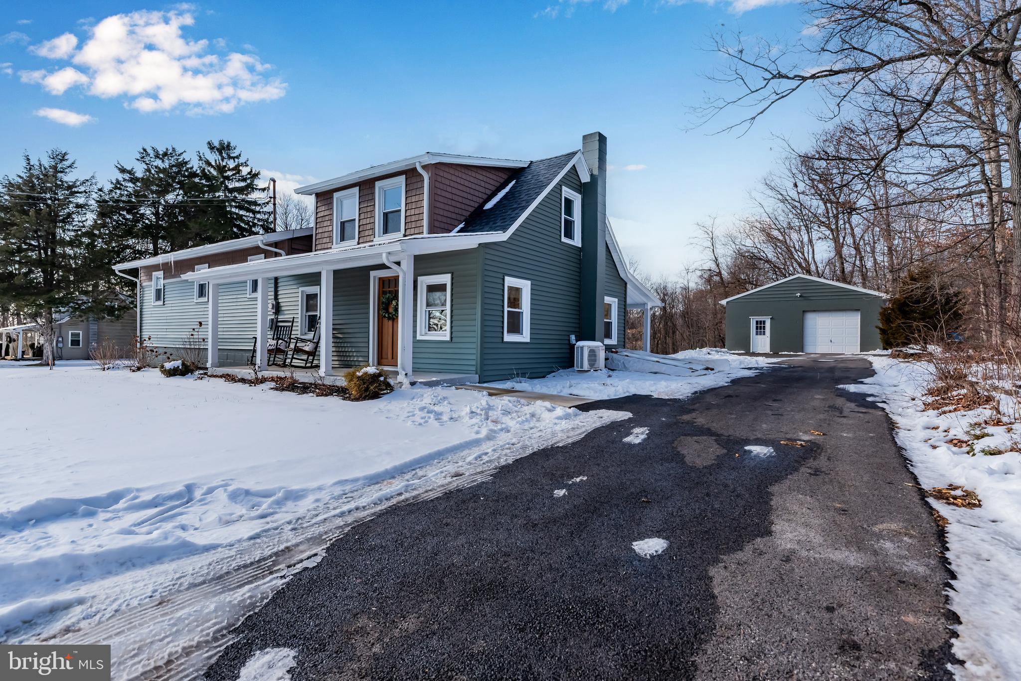 805 Buck Road Dover, PA 17315 - Photo 2 of 41 a front view of a house with a yard