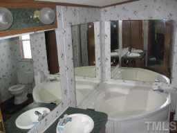 965 Dick Holeman Road Timberlake, NC 27583 - Photo 8 of 10 Master bath has seperate tub and shower