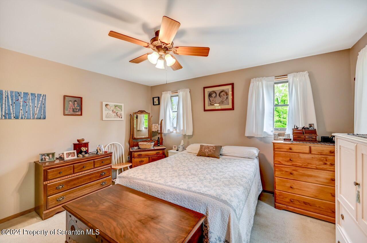 33 Hobbs Road Tunkhannock, PA 18657 - Photo 51 of 83 a bedroom with a bed and wooden floor