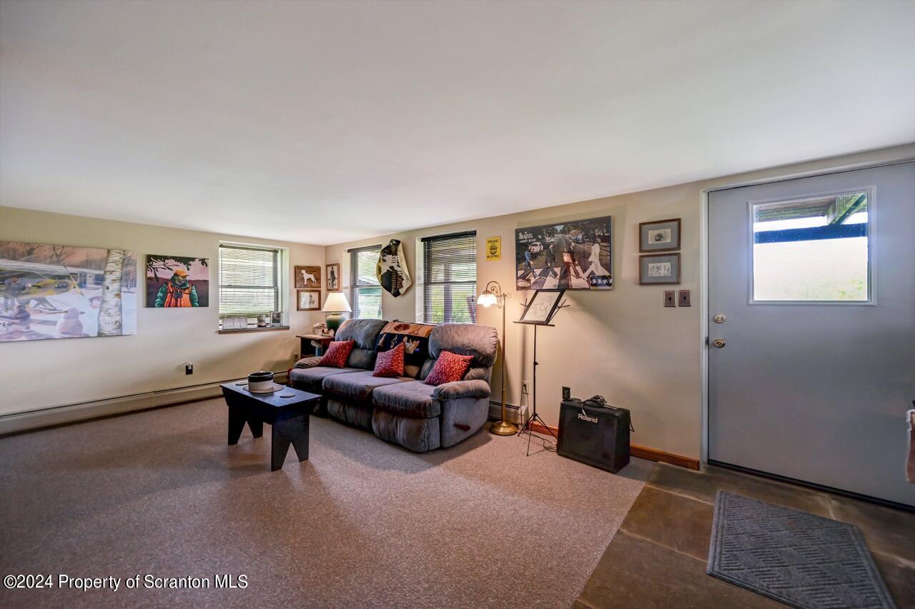 33 Hobbs Road Tunkhannock, PA 18657 - Photo 64 of 83 a living room with furniture and a window