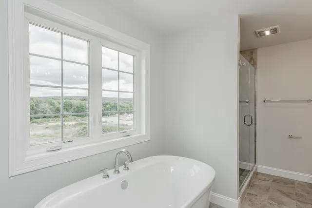 a bathroom with a sink and a bathtub