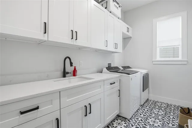 a view of swimming pool with lawn chairs and a yard