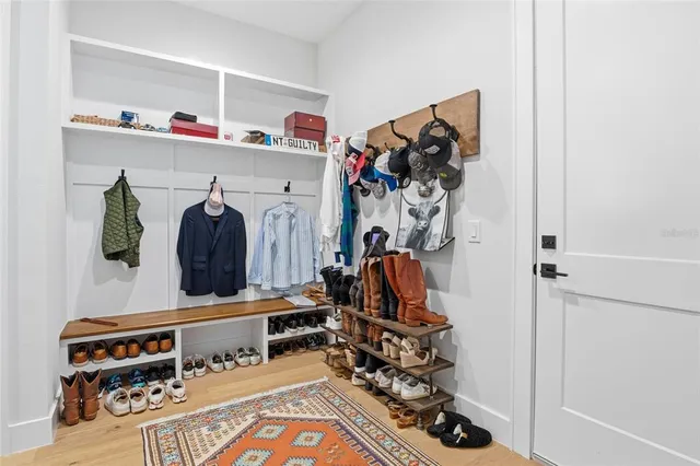 an aerial view of a house with a swimming pool