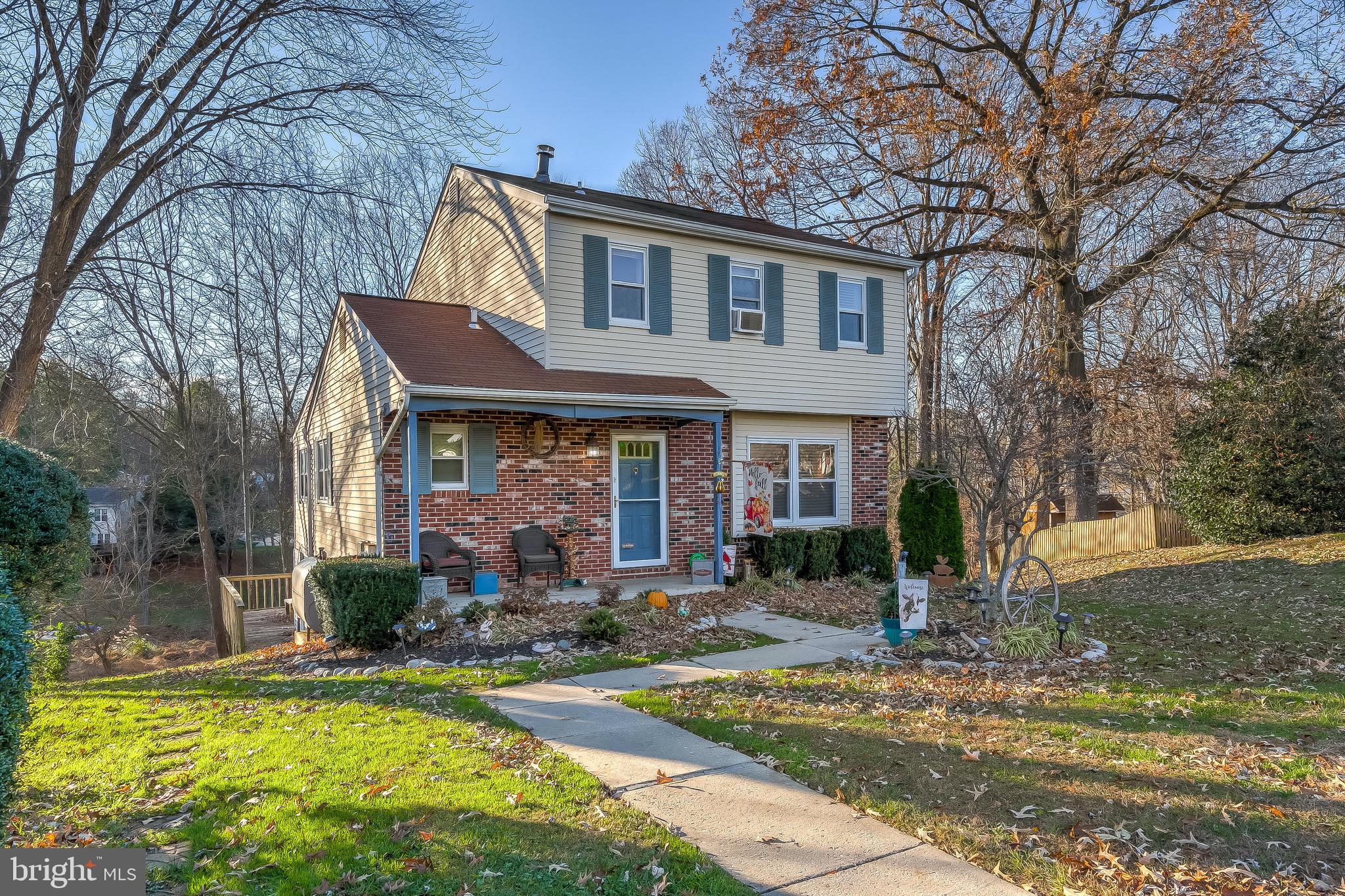 9326 Perglen Road Baltimore, MD 21236 - Photo 9 of 55 a front view of a house with garden