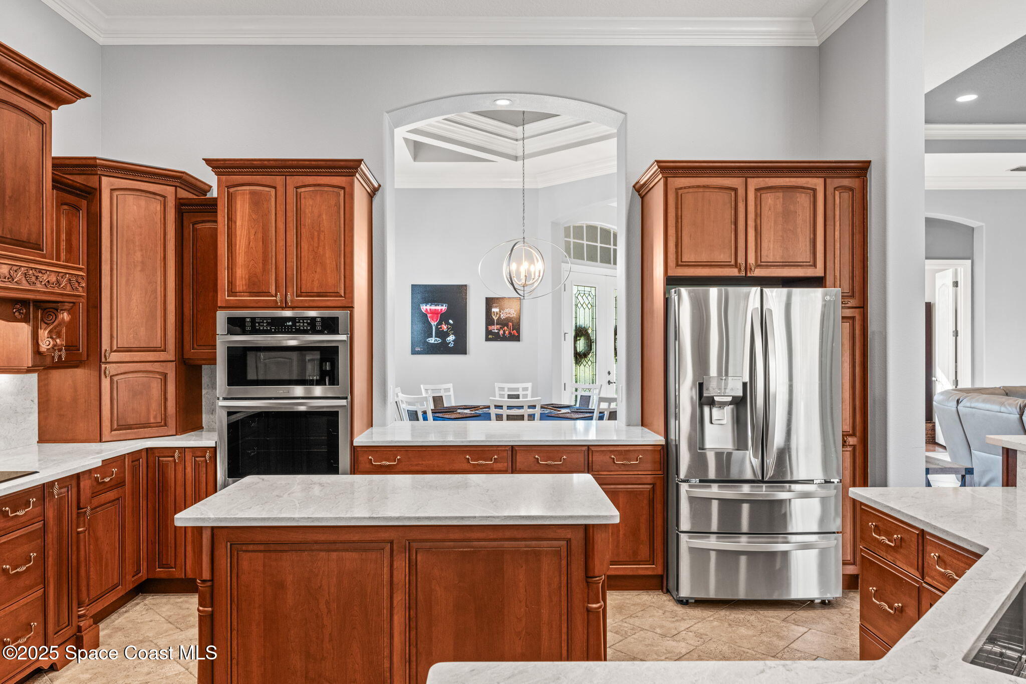 3152 BELLWIND Circle Rockledge, FL 32955 - Photo 14 of 47 a kitchen with kitchen island a counter top space stainless steel appliances and cabinets
