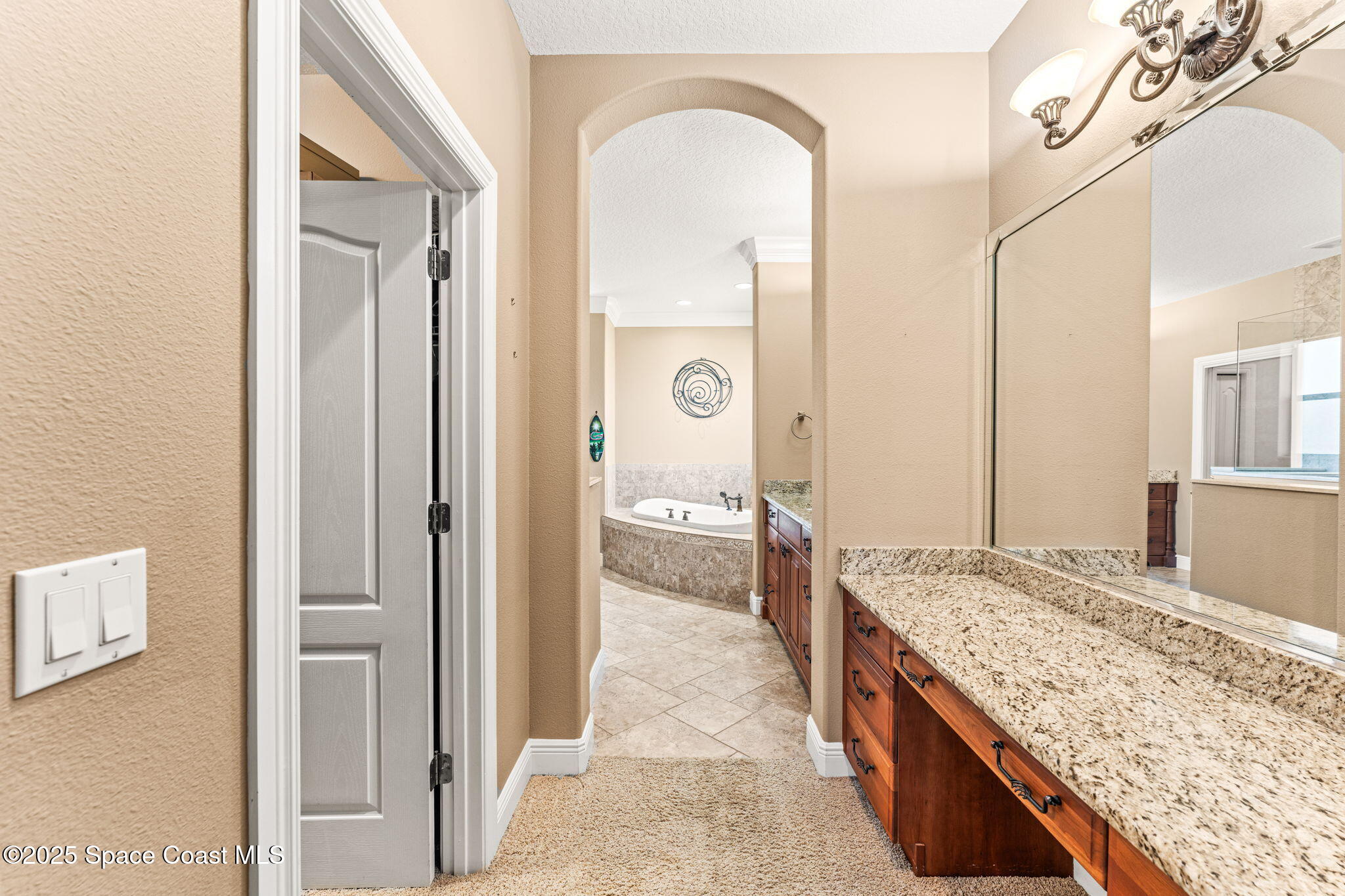 3152 BELLWIND Circle Rockledge, FL 32955 - Photo 20 of 47 a spacious bathroom with a granite countertop sink and a mirror