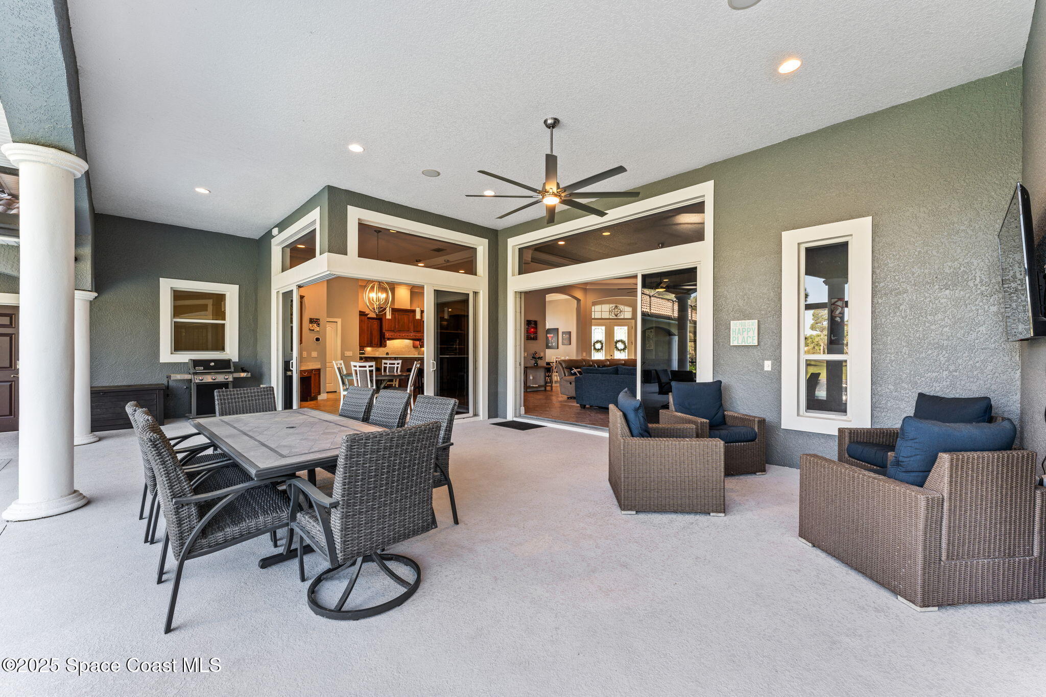 3152 BELLWIND Circle Rockledge, FL 32955 - Photo 33 of 47 a dining room with furniture wooden floor and a chandelier