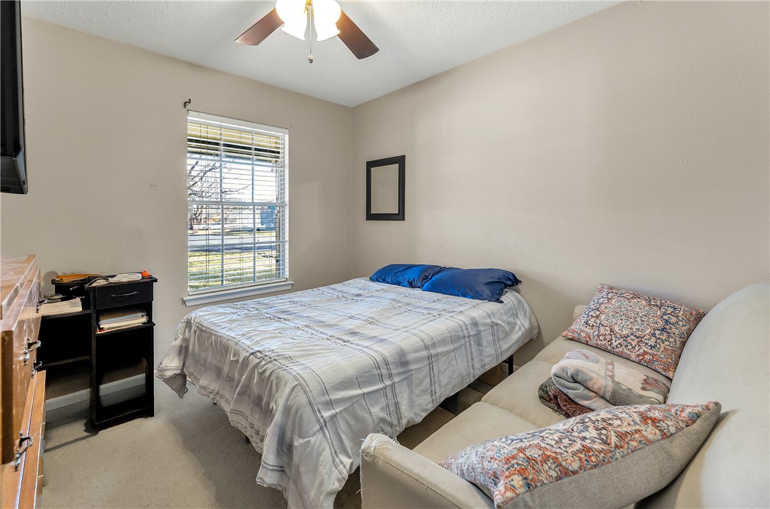 3319 Big Bend Drive Bryan, TX 77803 - Photo 18 of 19 a bedroom with bed and a window