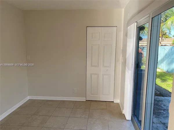 a view of hallway with shower
