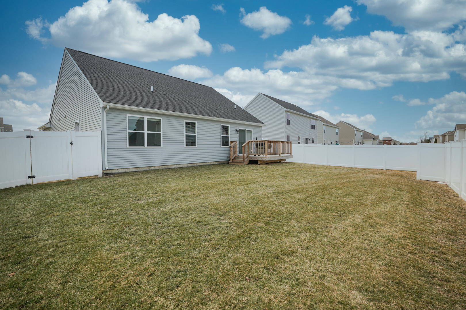 6611 Eich Drive Joliet, IL 60431 - Photo 20 of 21 a view of an house with backyard and garden