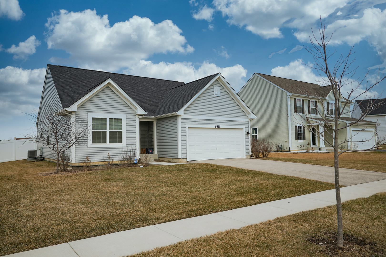 6611 Eich Drive Joliet, IL 60431 - Photo 2 of 21 a view of a house with a yard