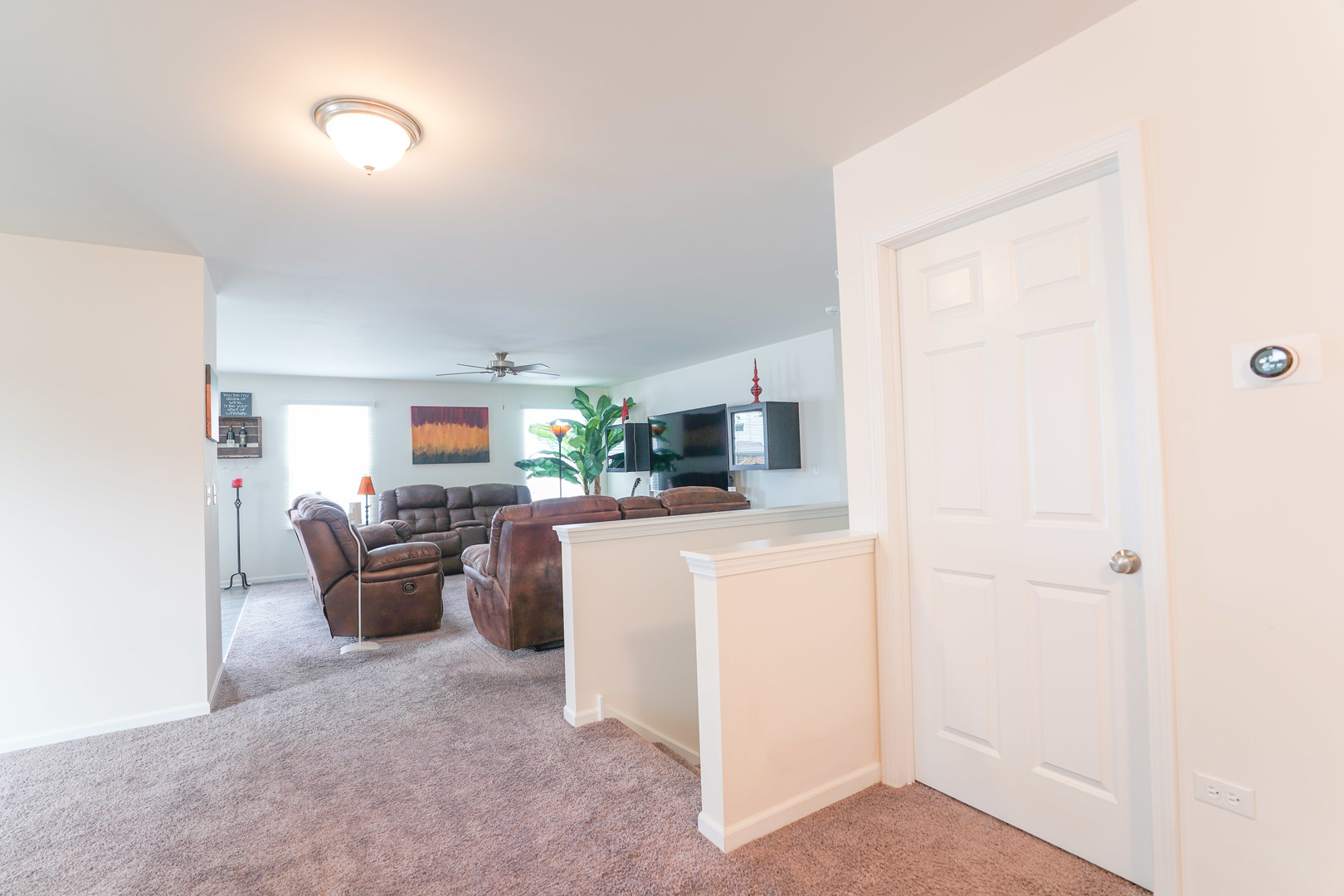 6611 Eich Drive Joliet, IL 60431 - Photo 3 of 21 a living room with furniture and a refrigerator