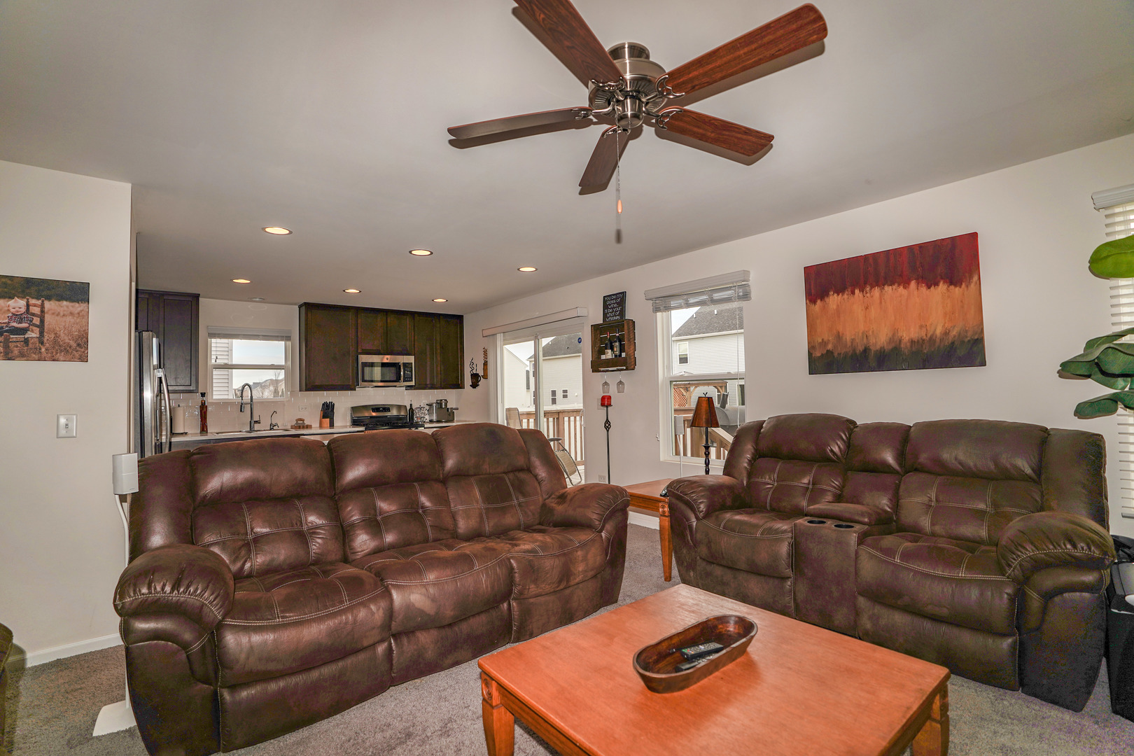 6611 Eich Drive Joliet, IL 60431 - Photo 8 of 21 a living room with furniture and a view of kitchen