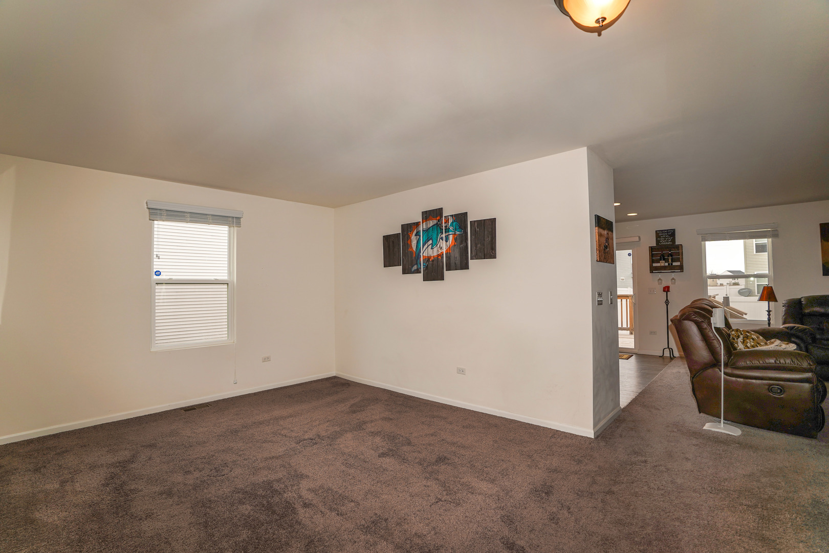 6611 Eich Drive Joliet, IL 60431 - Photo 9 of 21 a view of livingroom and hardwood
