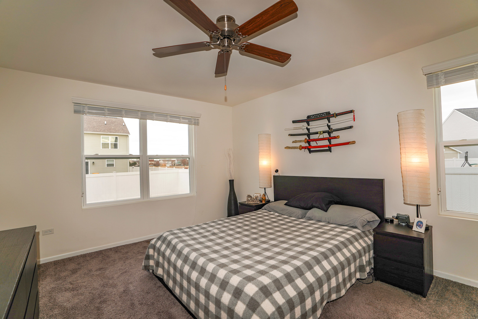 6611 Eich Drive Joliet, IL 60431 - Photo 10 of 21 a bedroom with a bed and a window