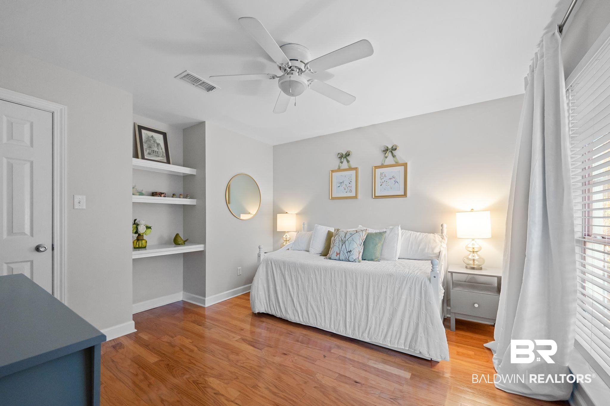 1825 Spring Hill Avenue Mobile, AL 36607 - Photo 21 of 43 Bedroom featuring light wood finished floors, ceiling fan, and an office area