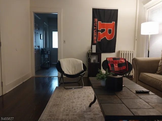 a bedroom with a bed and a table in it