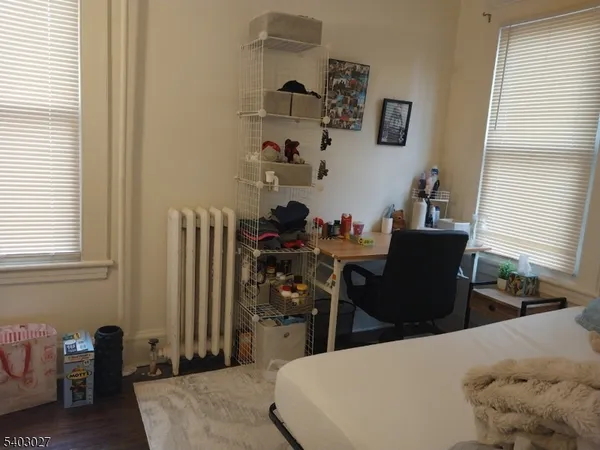 a kitchen with stainless steel appliances granite countertop a sink a stove and cabinets