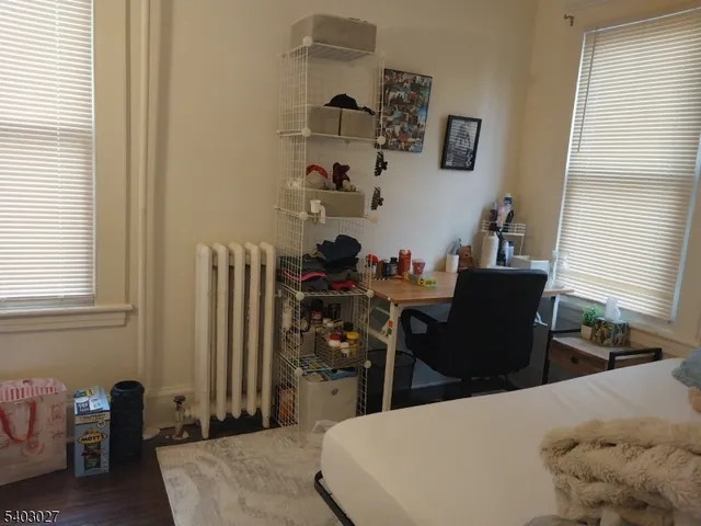 a kitchen with stainless steel appliances granite countertop a sink a stove and cabinets