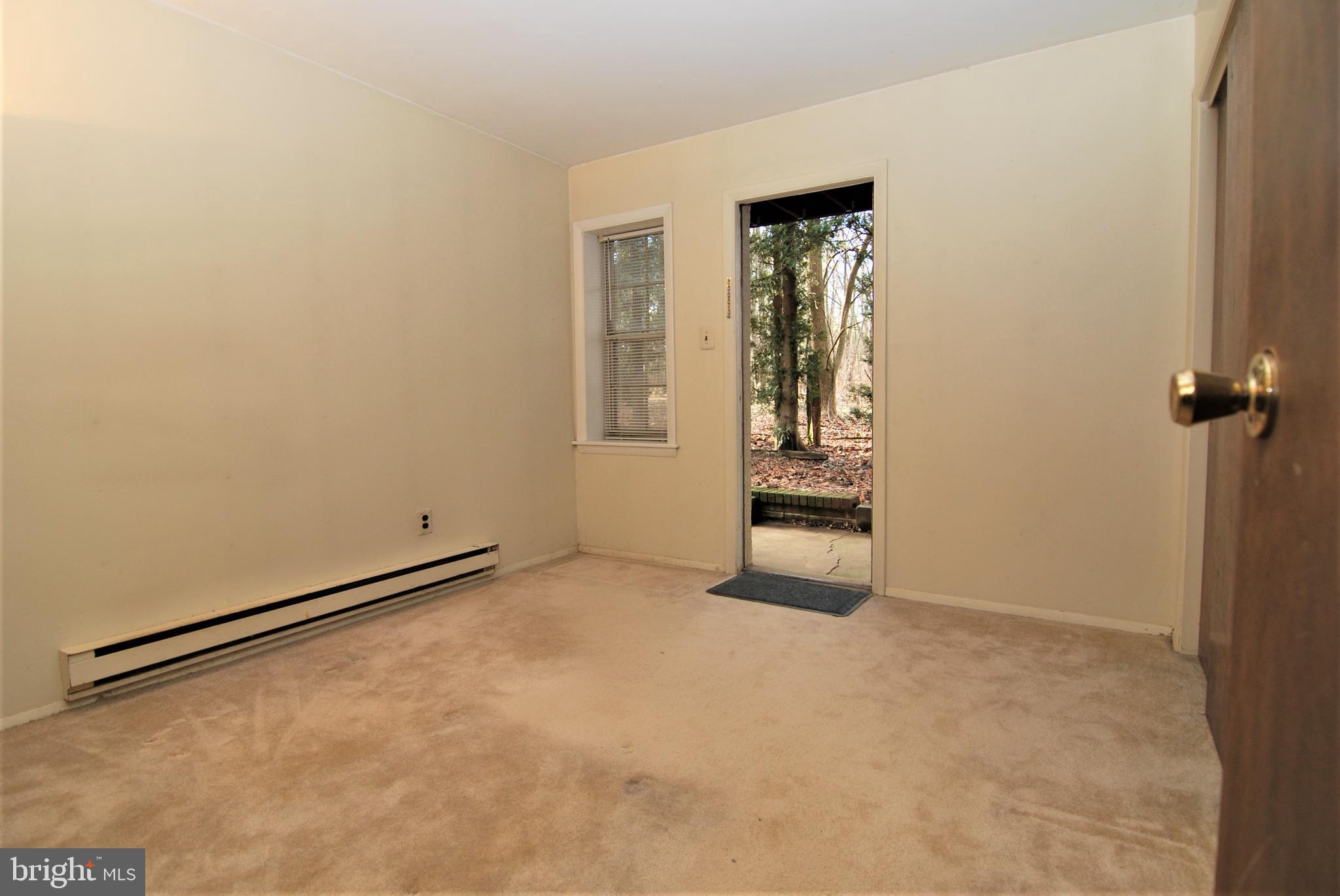 103 Deep Run Road, Unit D2 Dublin, PA 18917 - Photo 7 of 10 Private Entrance to Rear Patio from 2nd Bedroom!