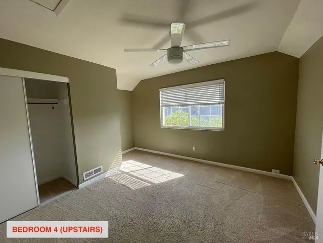 en empty room with windows