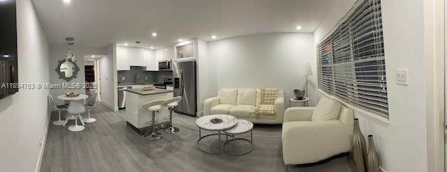 271 Durham, Unit 271 Deerfield Beach, FL 33442 - Photo 4 of 34 a living room with furniture and a table