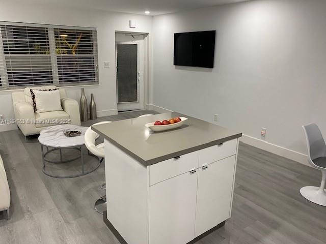 271 Durham, Unit 271 Deerfield Beach, FL 33442 - Photo 8 of 34 a living room with furniture and a flat screen tv