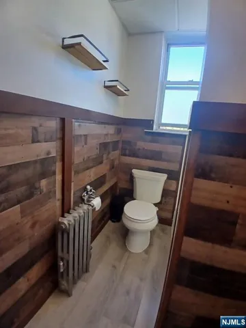 a bathroom with a toilet and a sink