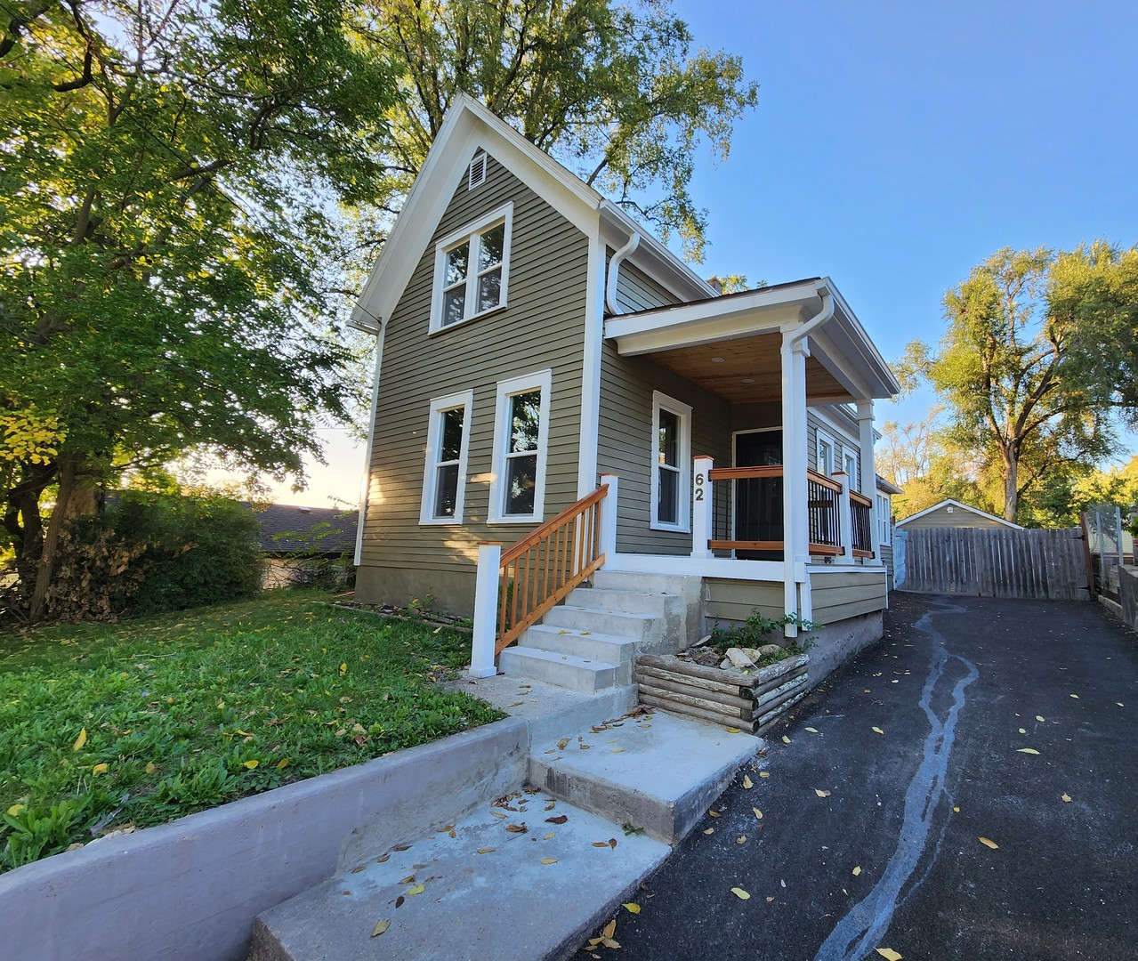 62 Seneca Street Elgin, IL 60120 - Photo 1 of 20 front view of a house with a yard