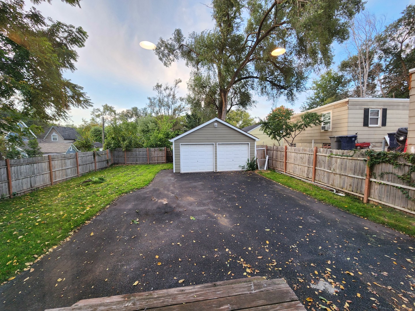 62 Seneca Street Elgin, IL 60120 - Photo 19 of 20 a front view of a house with garden