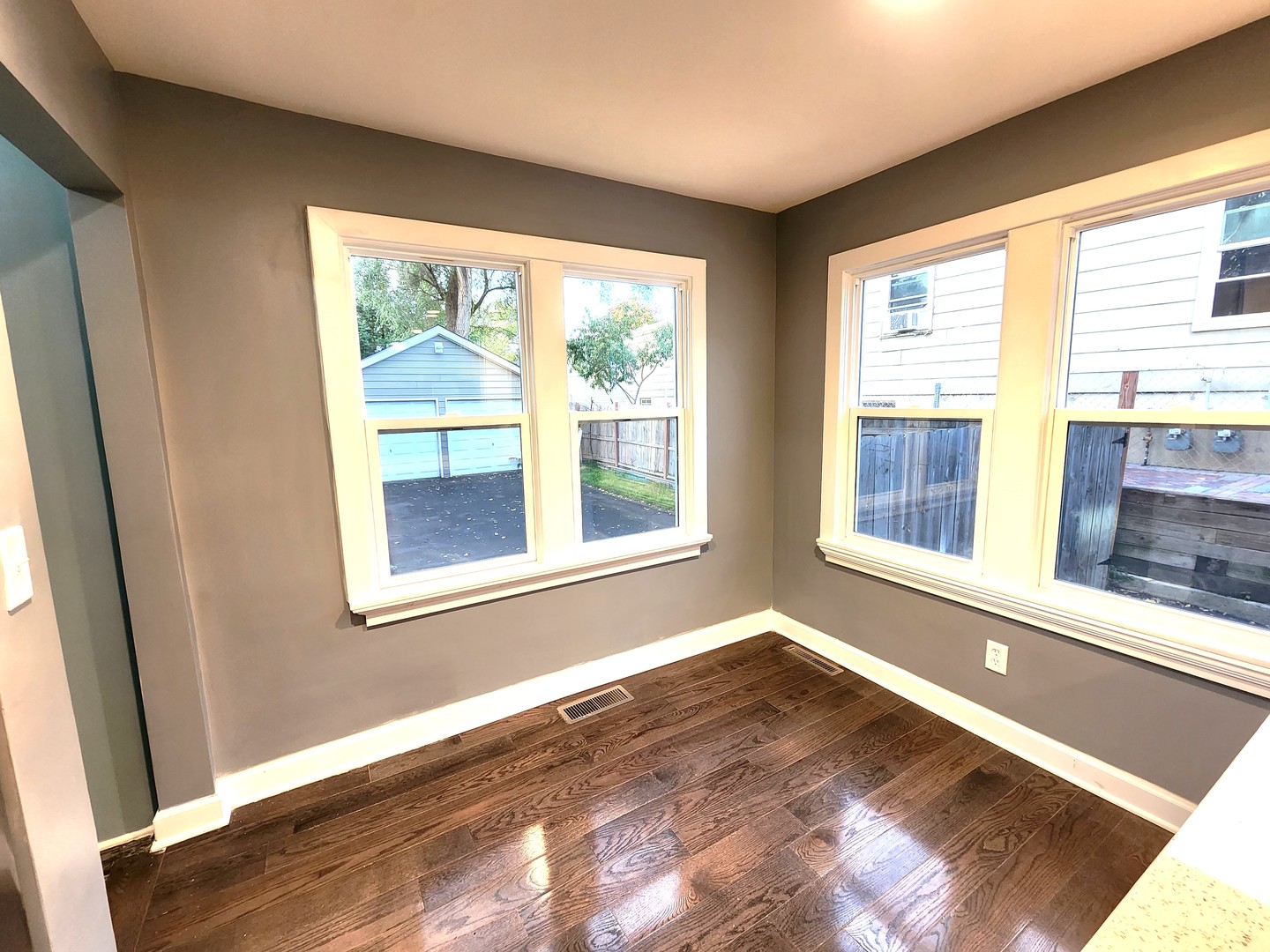 62 Seneca Street Elgin, IL 60120 - Photo 6 of 20 a view of an empty room with a window