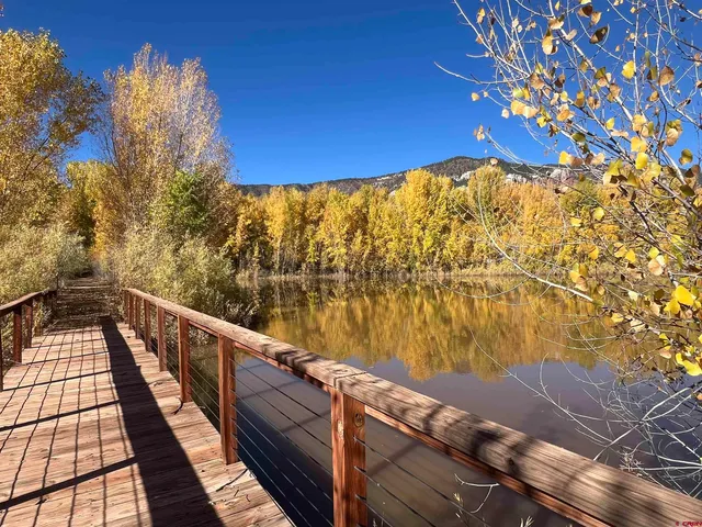 a view of a balcony with lake view