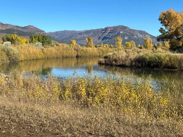 a view of a house with a mountain