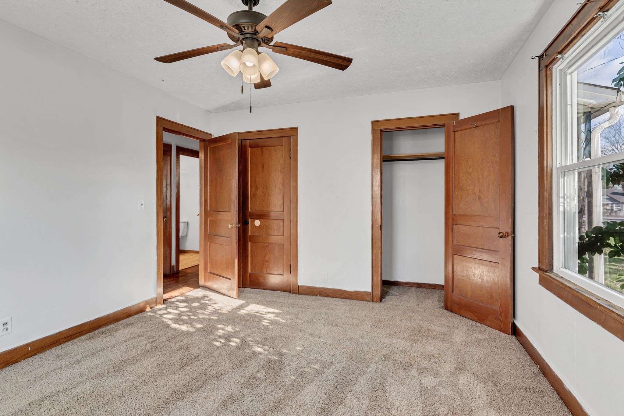 404 Gibson Street Portland, TN 37148 - Photo 16 of 26 an empty room with closet and windows