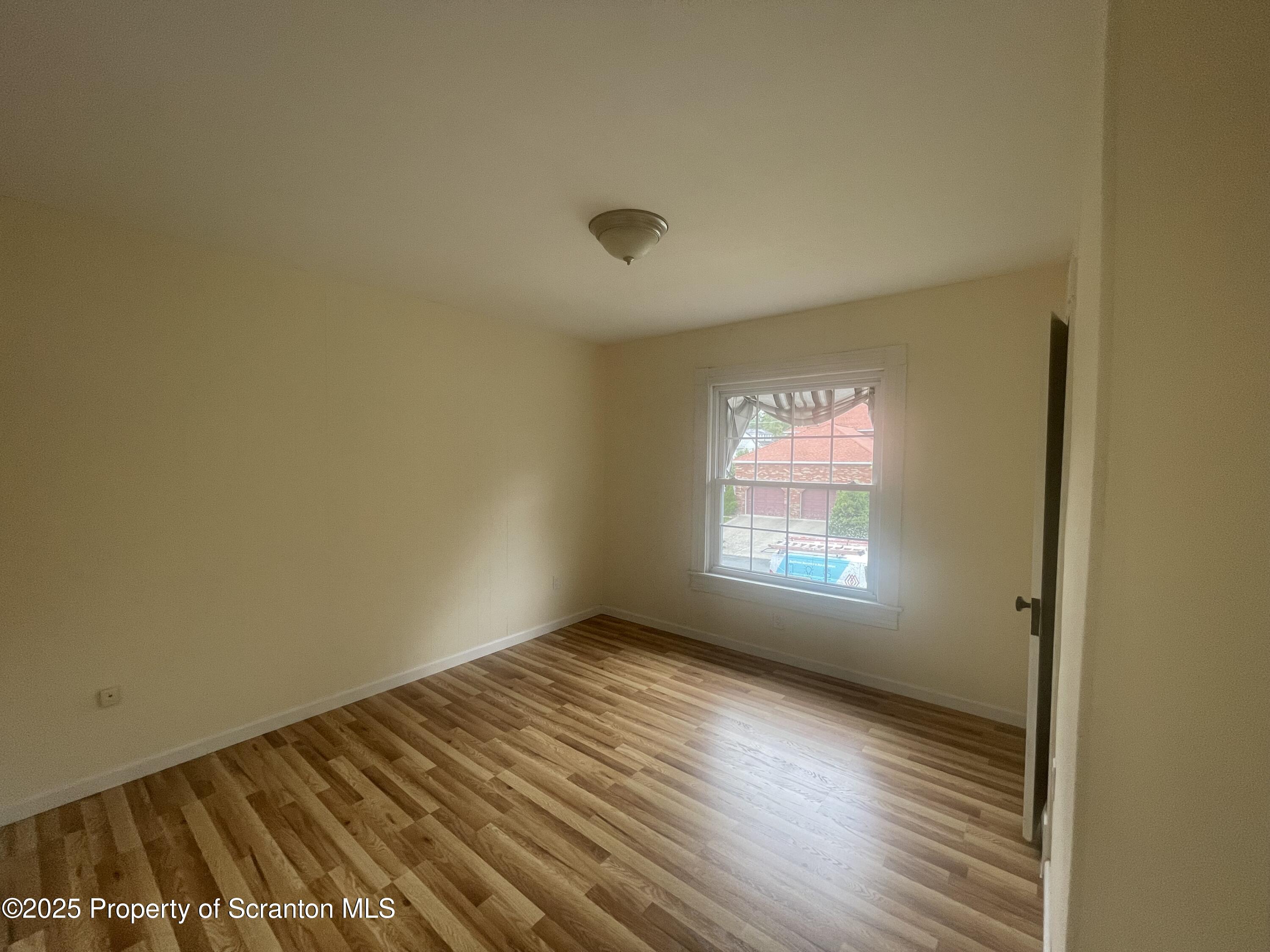 608 North Sumner Avenue, Unit 608 Scranton, PA 18504 - Photo 14 of 22 a view of an empty room and window
