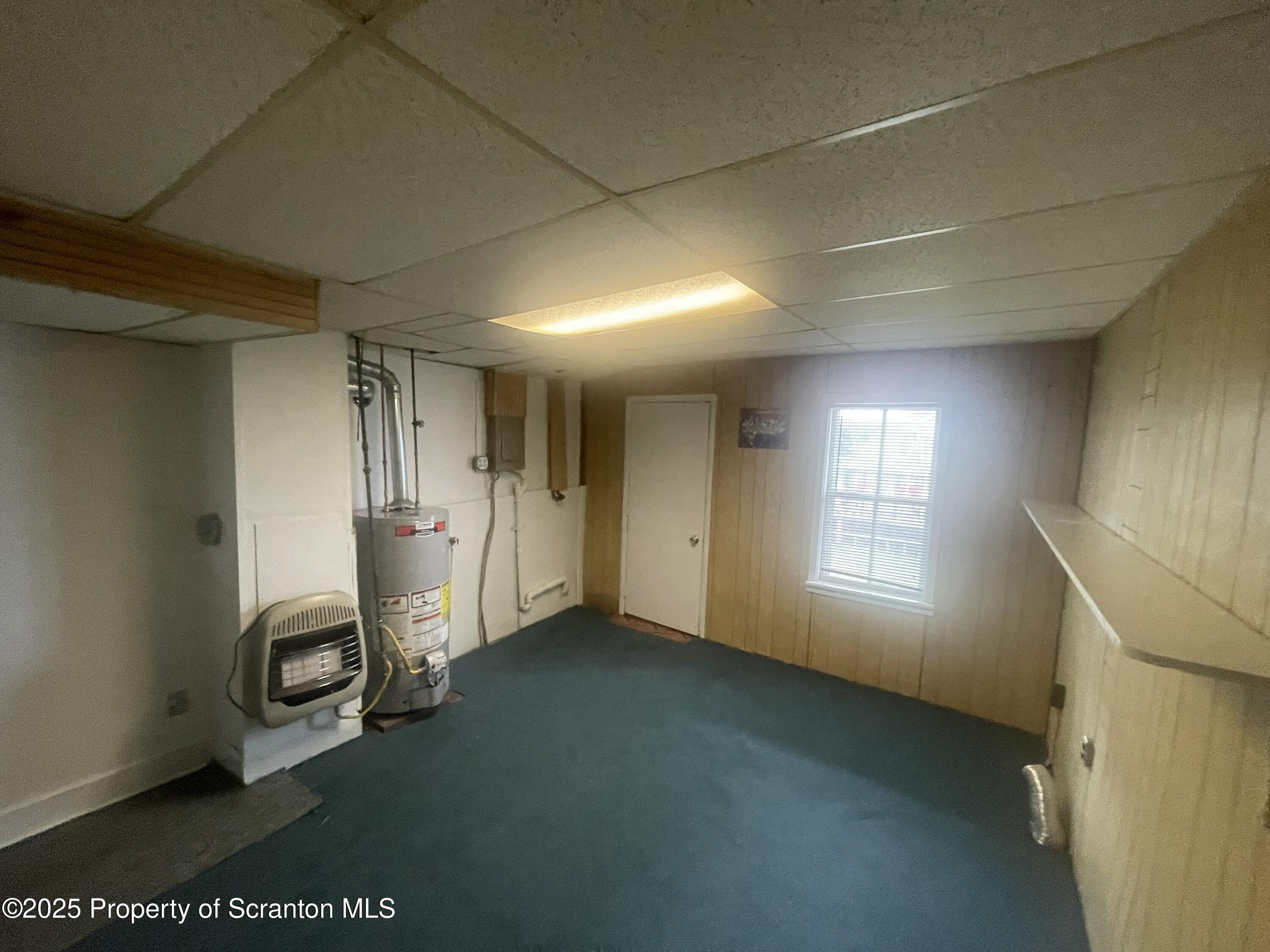 608 North Sumner Avenue, Unit 608 Scranton, PA 18504 - Photo 16 of 22 a view of a livingroom with an empty space and a window