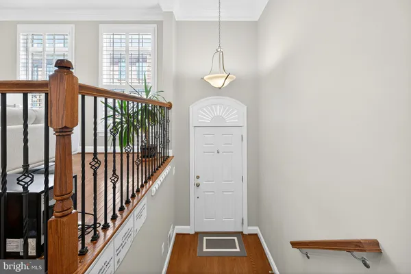 a view of hallway with windows