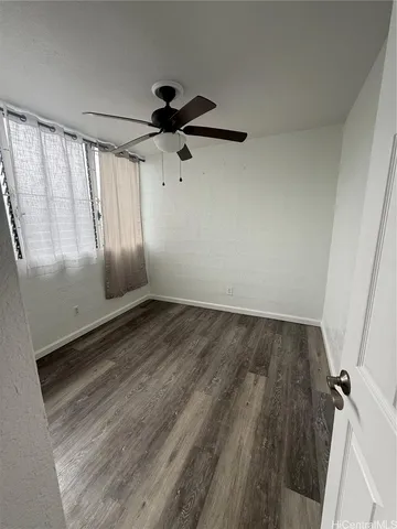 a bathroom with a toilet a sink and bathtub