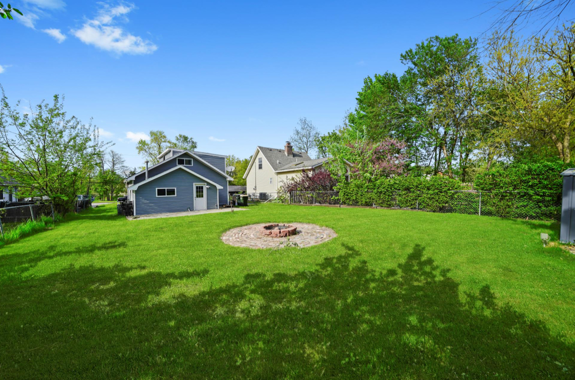 26427 West Prospect Avenue Antioch, IL 60002 - Photo 13 of 22 a house with green field in front of it