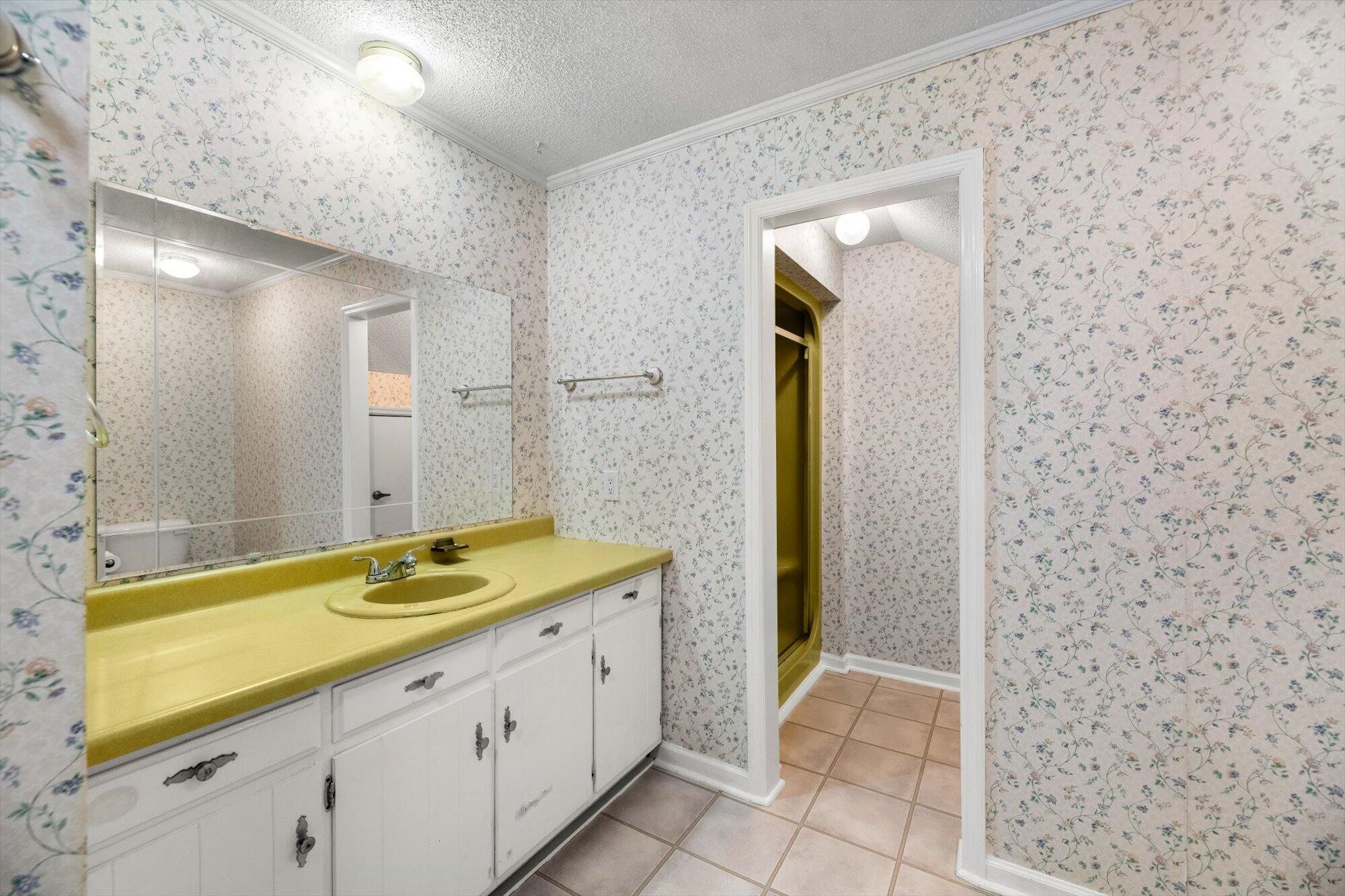 1302 Ridgeway Circle Athens, TN 37303 - Photo 17 of 17 a bathroom with a granite countertop sink and a mirror