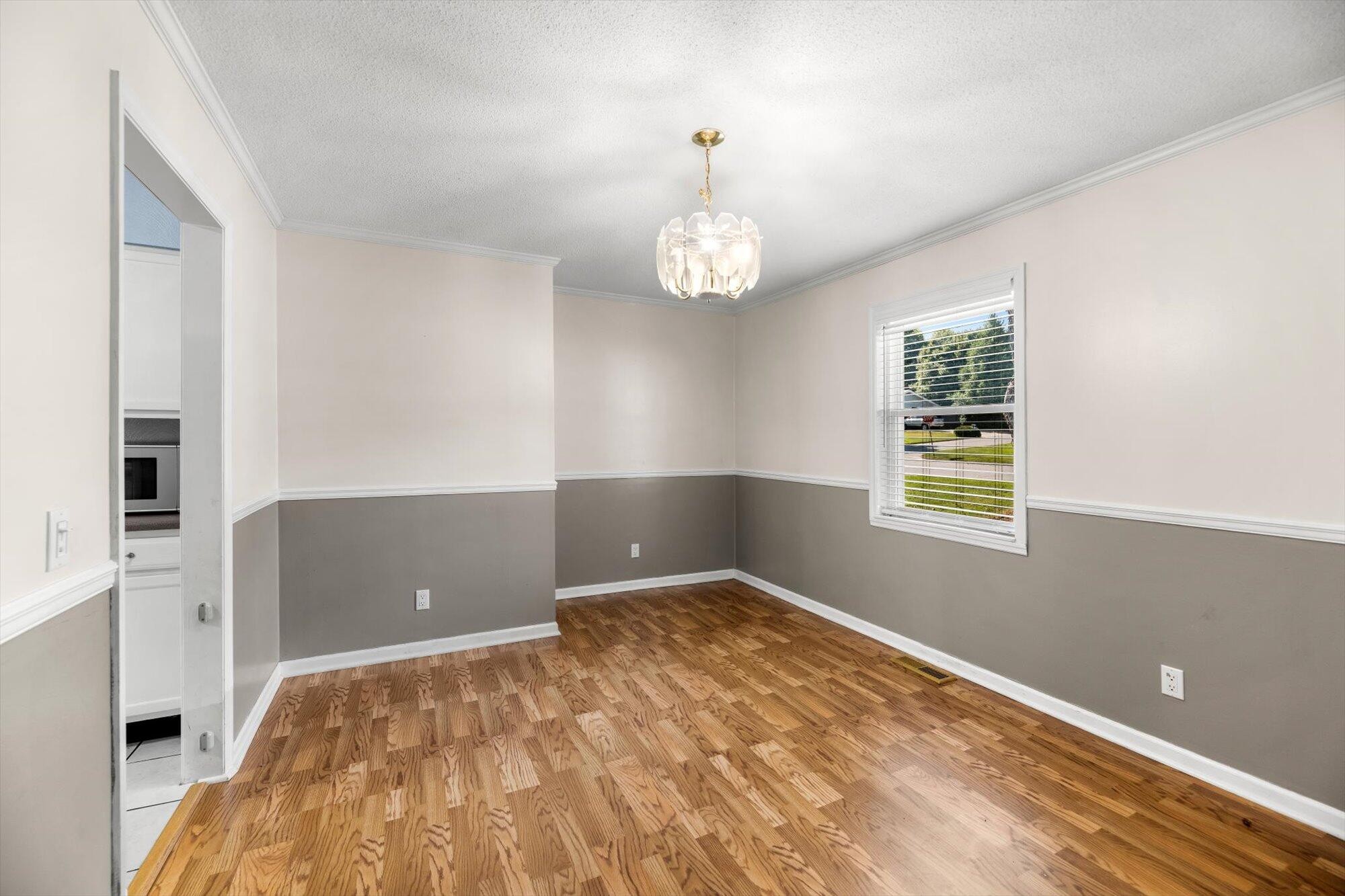 1302 Ridgeway Circle Athens, TN 37303 - Photo 6 of 17 a bedroom with a bed and a window