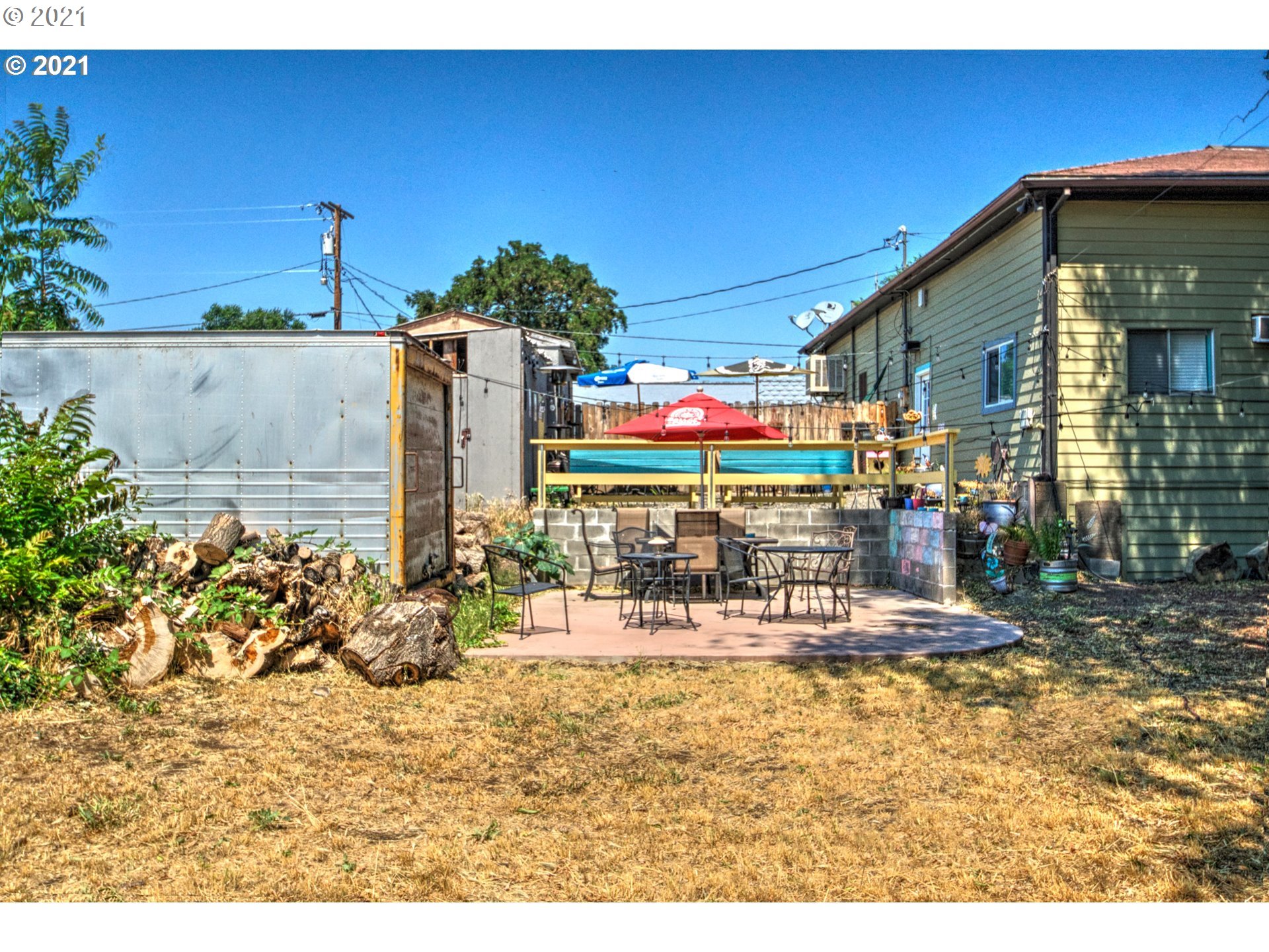 600 State Street Lyle, WA 98635 - Photo 7 of 8 a front view of a house with outdoor seating
