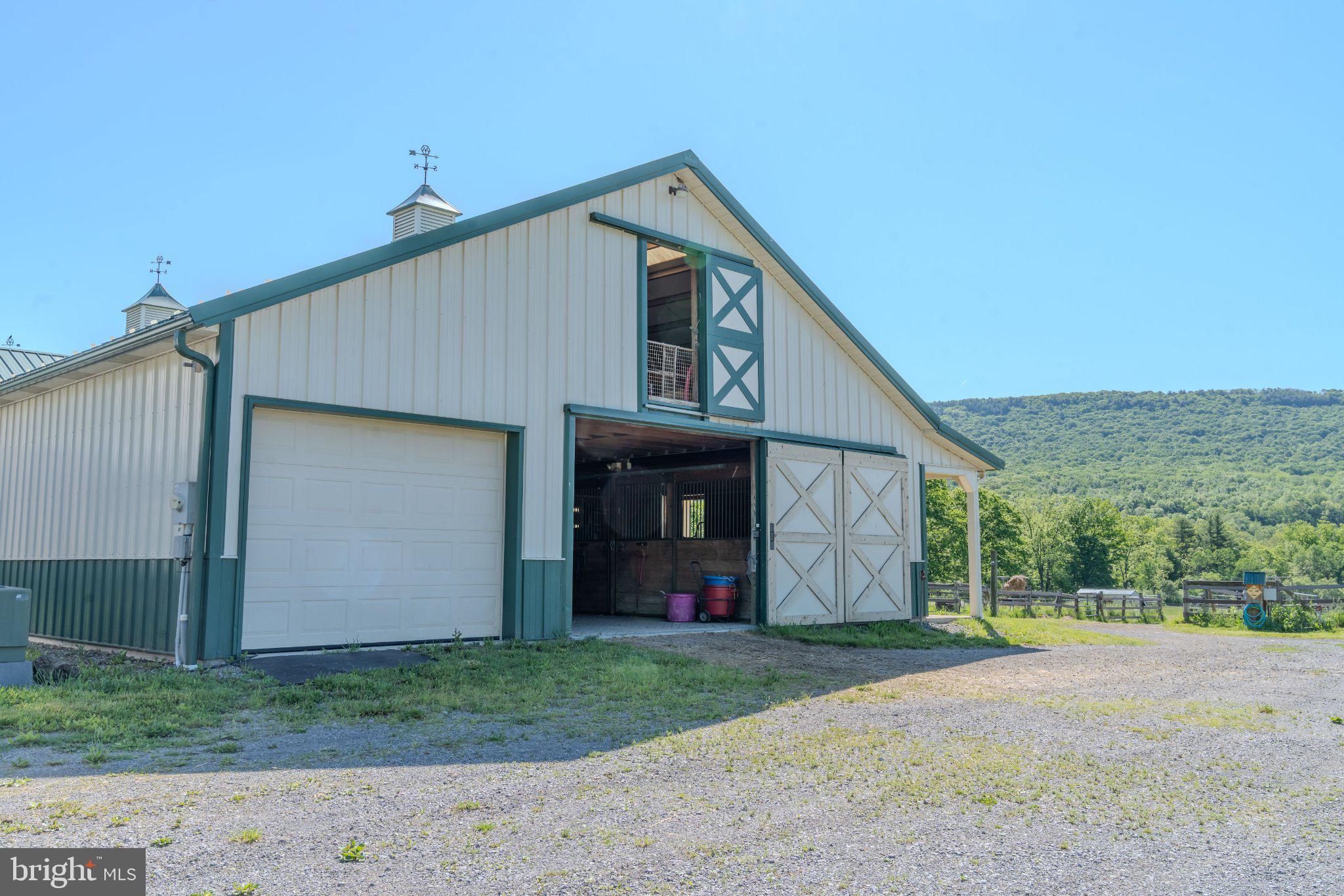 4503 Scotch Valley Road Hollidaysburg, PA 16648 - Photo 59 of 85 a front view of a house with a yard and garage