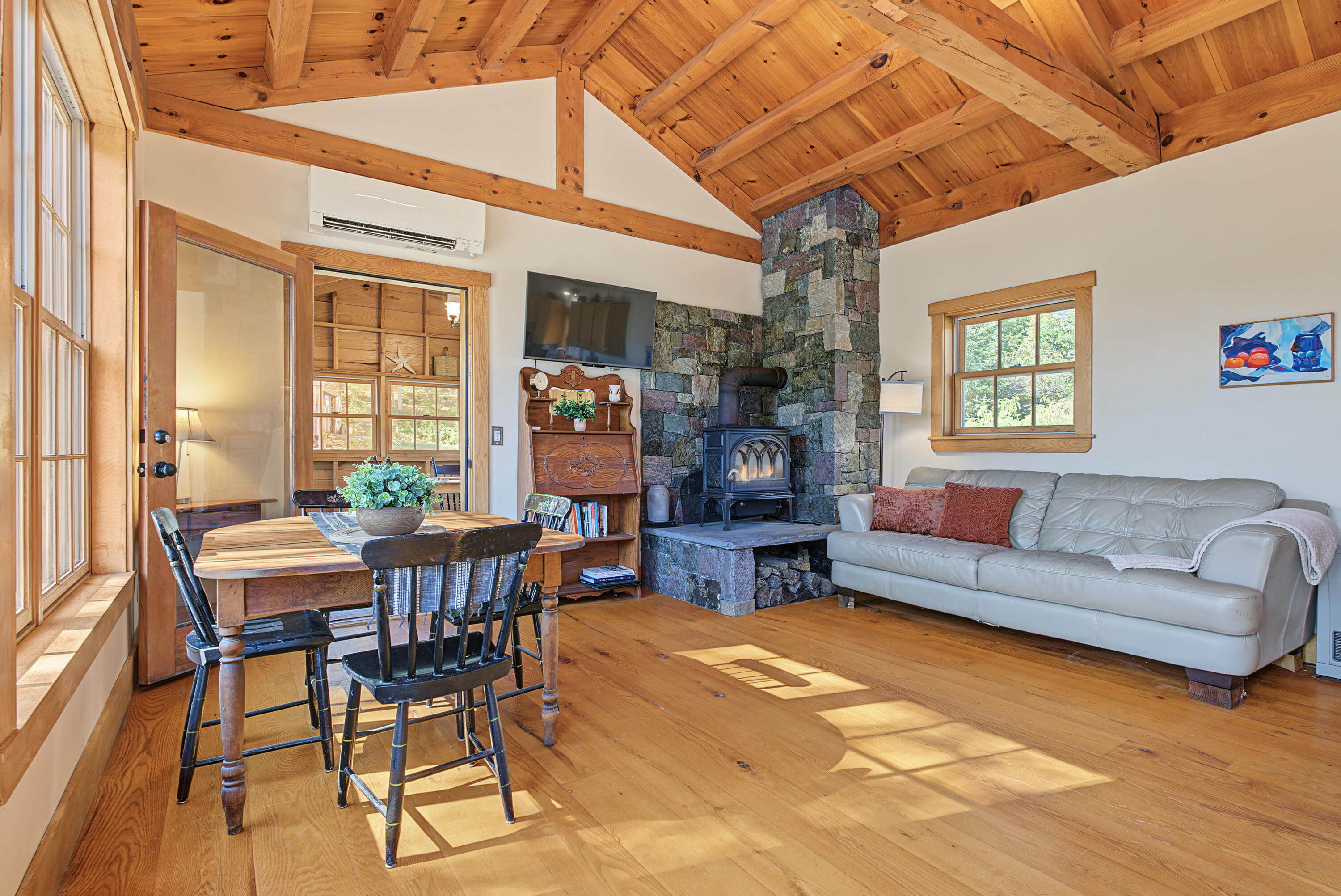 1581 Main Road Westport Island, ME 04578 - Photo 20 of 86 Living room with cozy wood stove