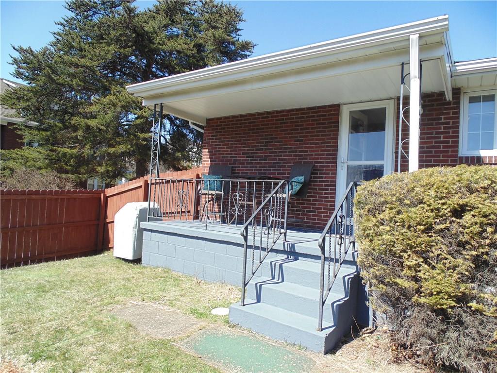 500 Walnut Street Springdale, PA 15144 - Photo 3 of 16 Covered back porch with new roof overlooking fenced in back yard.