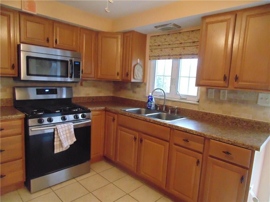 500 Walnut Street Springdale, PA 15144 - Photo 10 of 16 Another view of the kitchen. The kitchen is large enough for a small table and chairs.