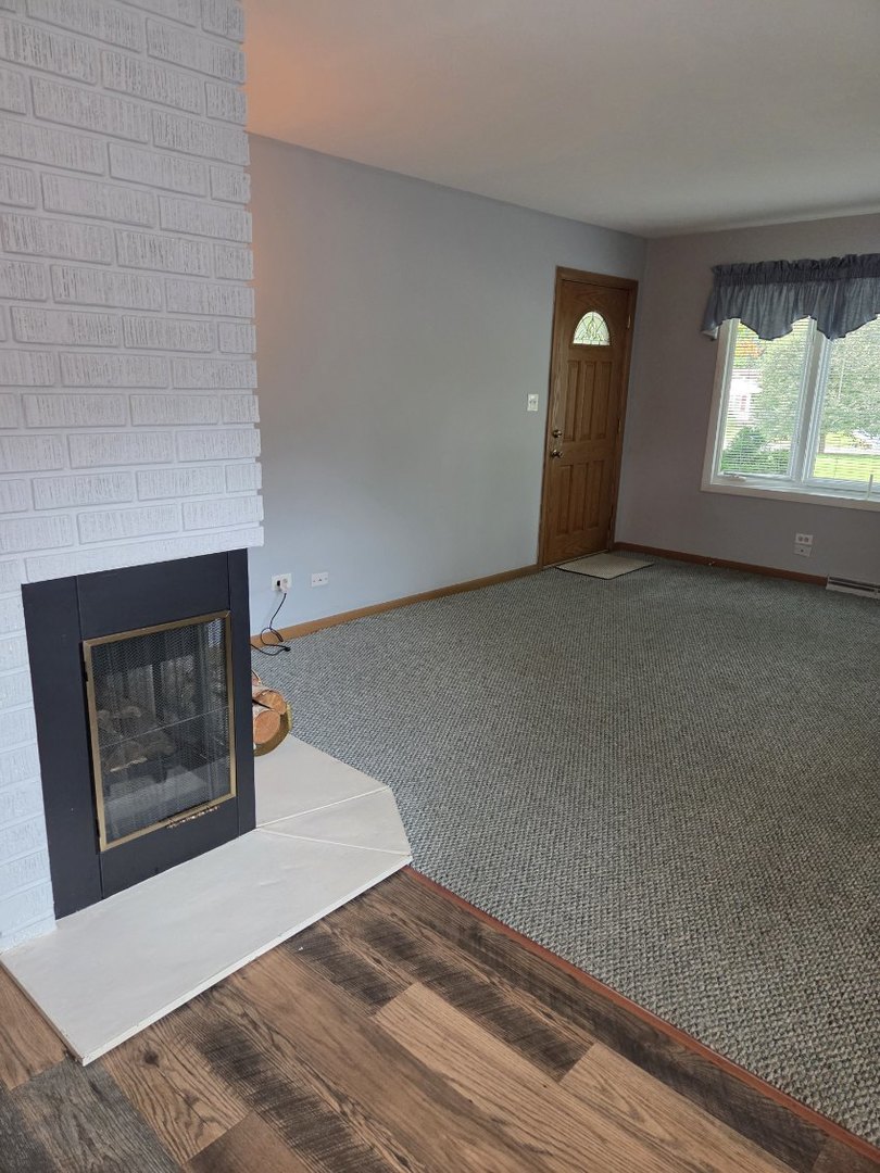 215 Brice Avenue Mundelein, IL 60060 - Photo 5 of 15 a view of an empty room and window