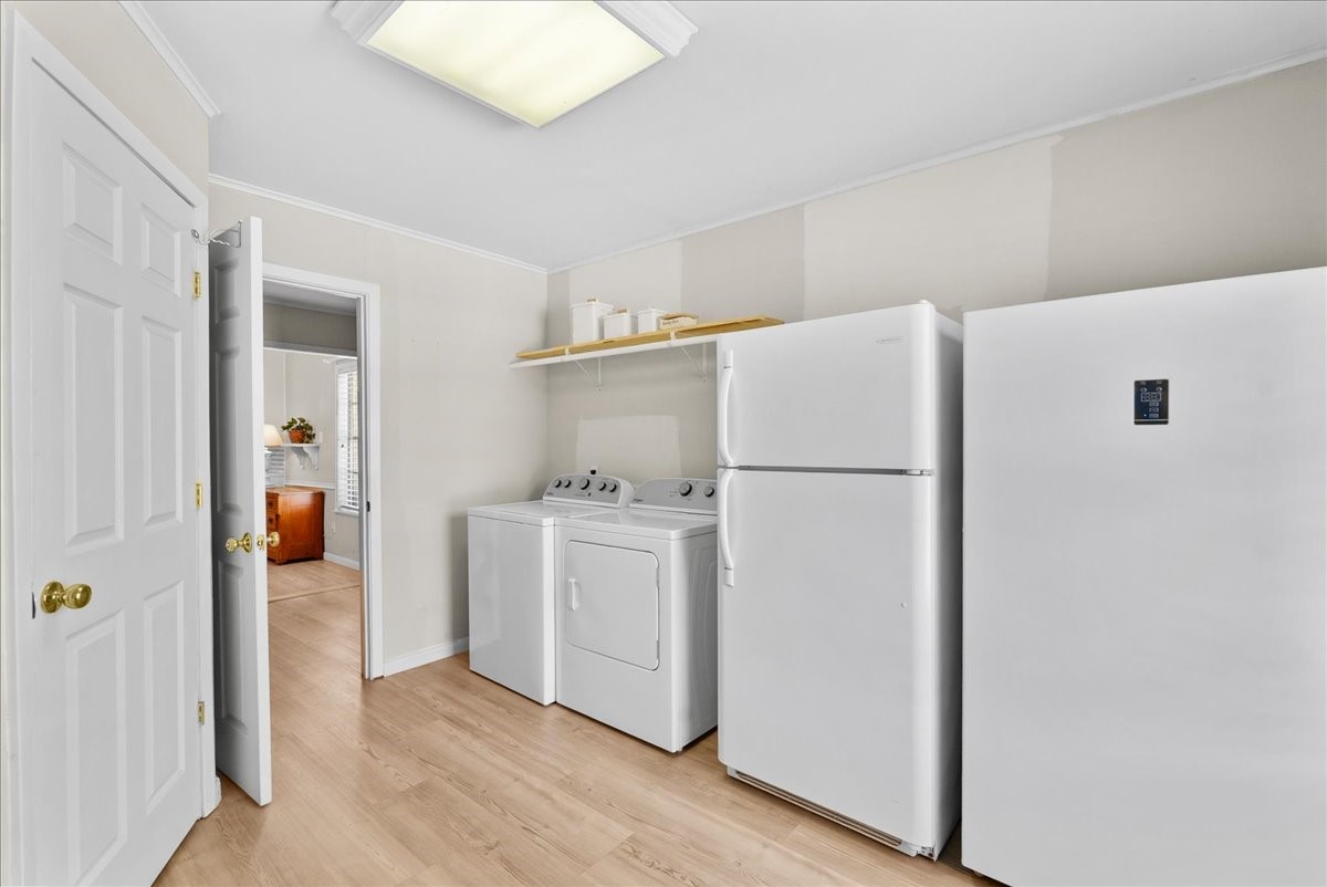 804 Otter Road Anahuac, TX 77514 - Photo 37 of 44 Perfect space for additional fridge or freezers.